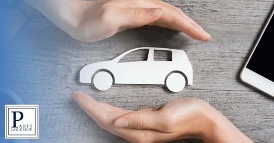auto insurance adjusters hands around car outline