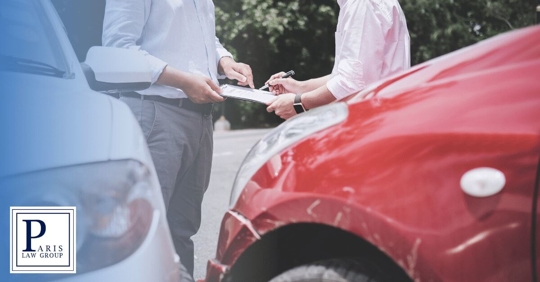 insurance adjuster talking with claimant after an accident