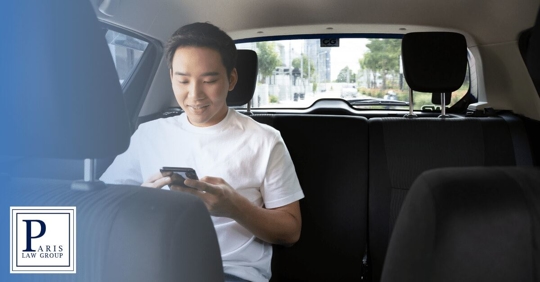 rider in the backseat of a rideshare vehicle
